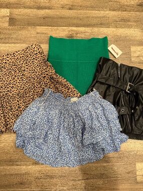 Lot of 4 size small skirts / skorts